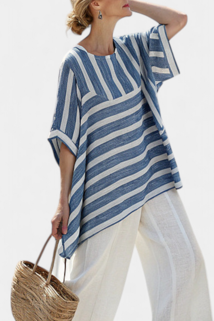 Comfortable women's striped batwing sleeve top & matching wide-leg pants. Stylish two-piece summer resort wear.