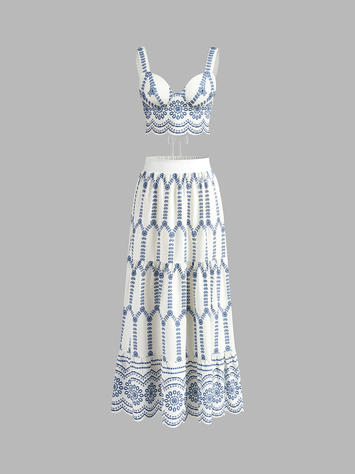 Women's blue & white printed sleeveless tie-back skirt set, perfect for summer vacation or beachwear. Chic two-piece.