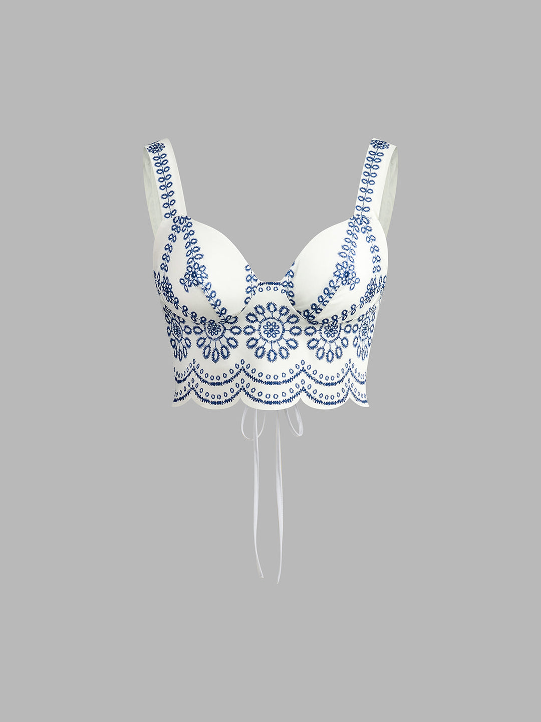 Stylish women's printed two-piece skirt set with sleeveless top & tie-back detail. Ideal for casual spring & summer fashion.
