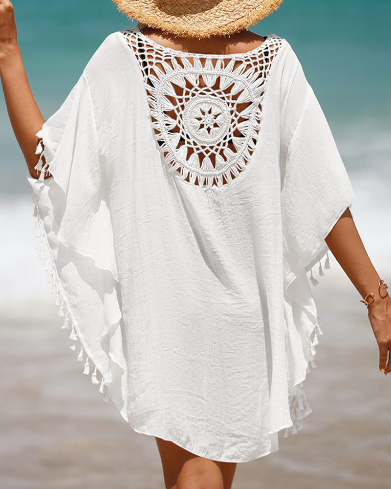 Women's Bohemian beach cover-up with tassels, perfect for swimwear, resort wear & summer fashion.