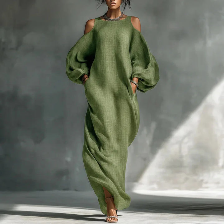 Elegant women's bohemian cold shoulder maxi dress. Long sleeve, flowy, and relaxed fit for casual summer or fall wear.