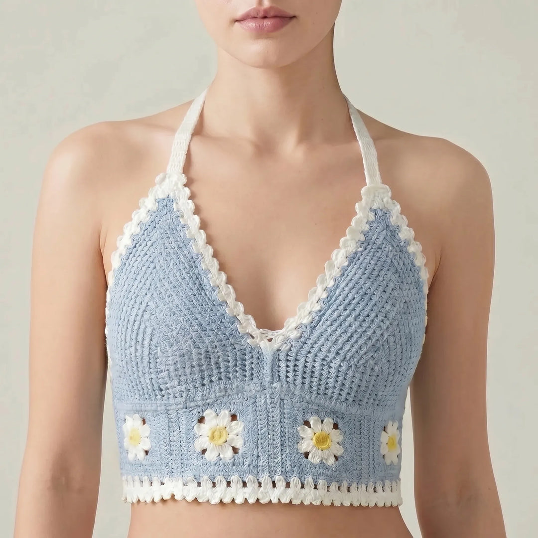 Chic women's Bohemian crochet crop top with a unique clover pattern, perfect festival wear.