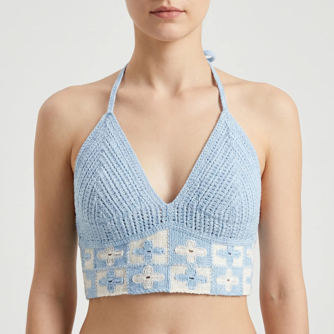 Textured women's Bohemian crochet crop top, breathable summer fabric, ideal for beach & festivals.