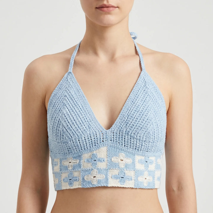 Textured women's Bohemian crochet crop top, breathable summer fabric, ideal for beach & festivals.