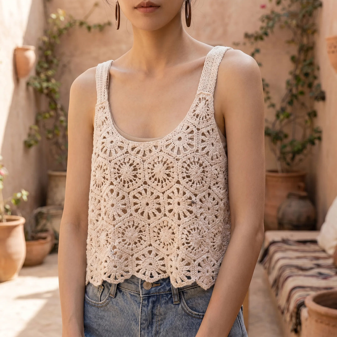 Women's bohemian crochet knit sleeveless crop top in white, perfect for summer beachwear & festival outfits.