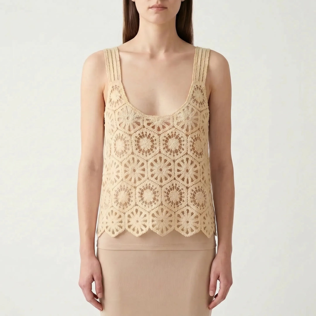 Chic women's bohemian crochet crop top, sleeveless & open knit. Versatile for summer, beach, or festival fashion.