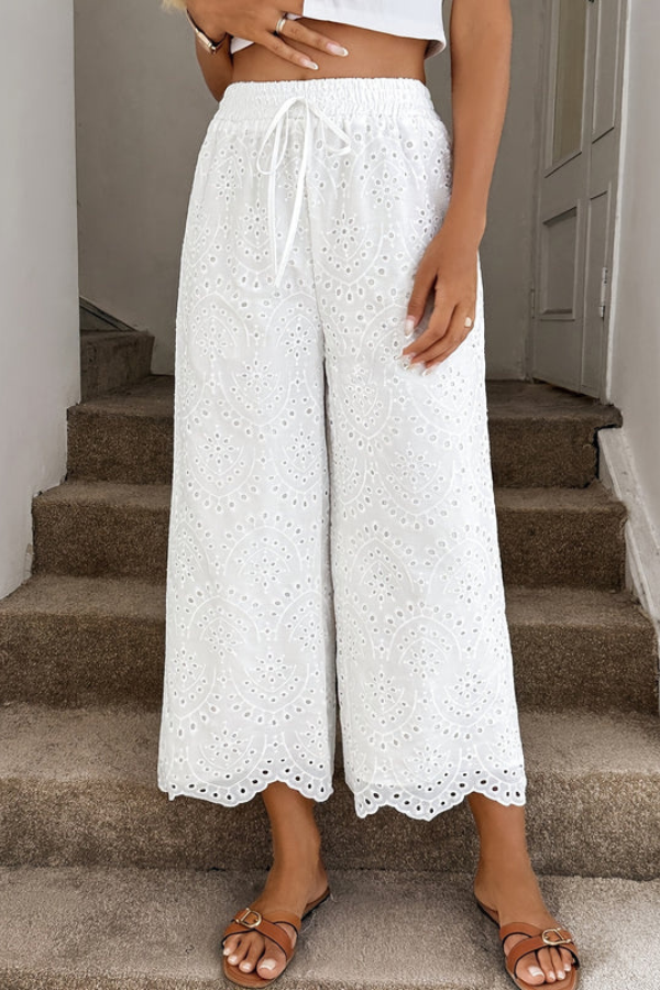 Women's bohemian cropped summer pants in relaxed fit, perfect for effortless casual style & vacation wear.