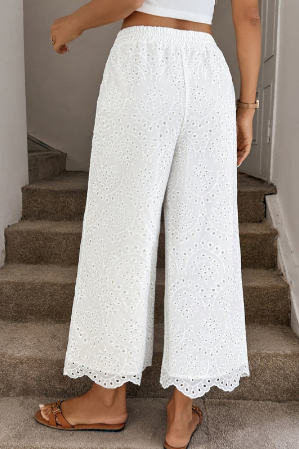 Chic women's cropped capri pants in a bohemian style, perfect for summer fashion, beachwear, & casual outings.