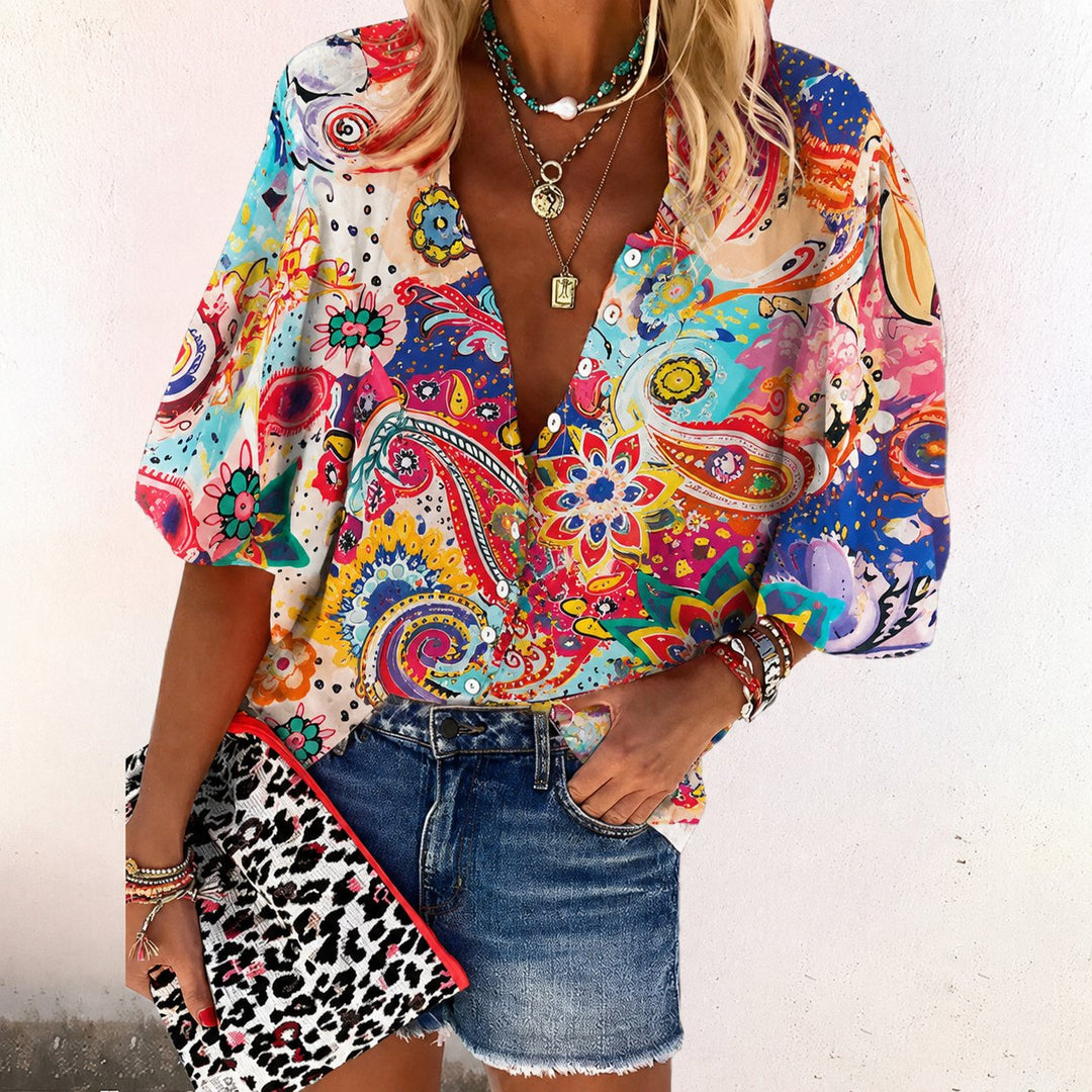 Trendy women's floral print V-neck top with short sleeves. Ideal for bohemian summer outfits & vacation wear.