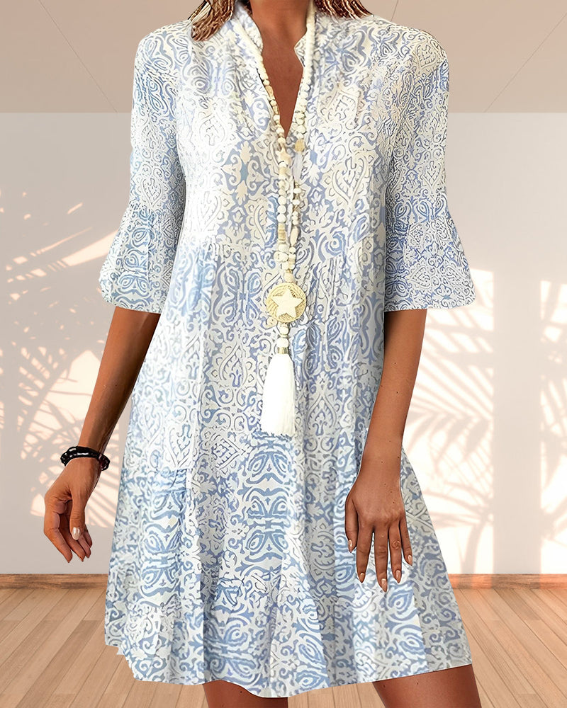 Women's bohemian floral V-neck midi summer dress with flowy bell sleeves, perfect for casual wear or vacation.
