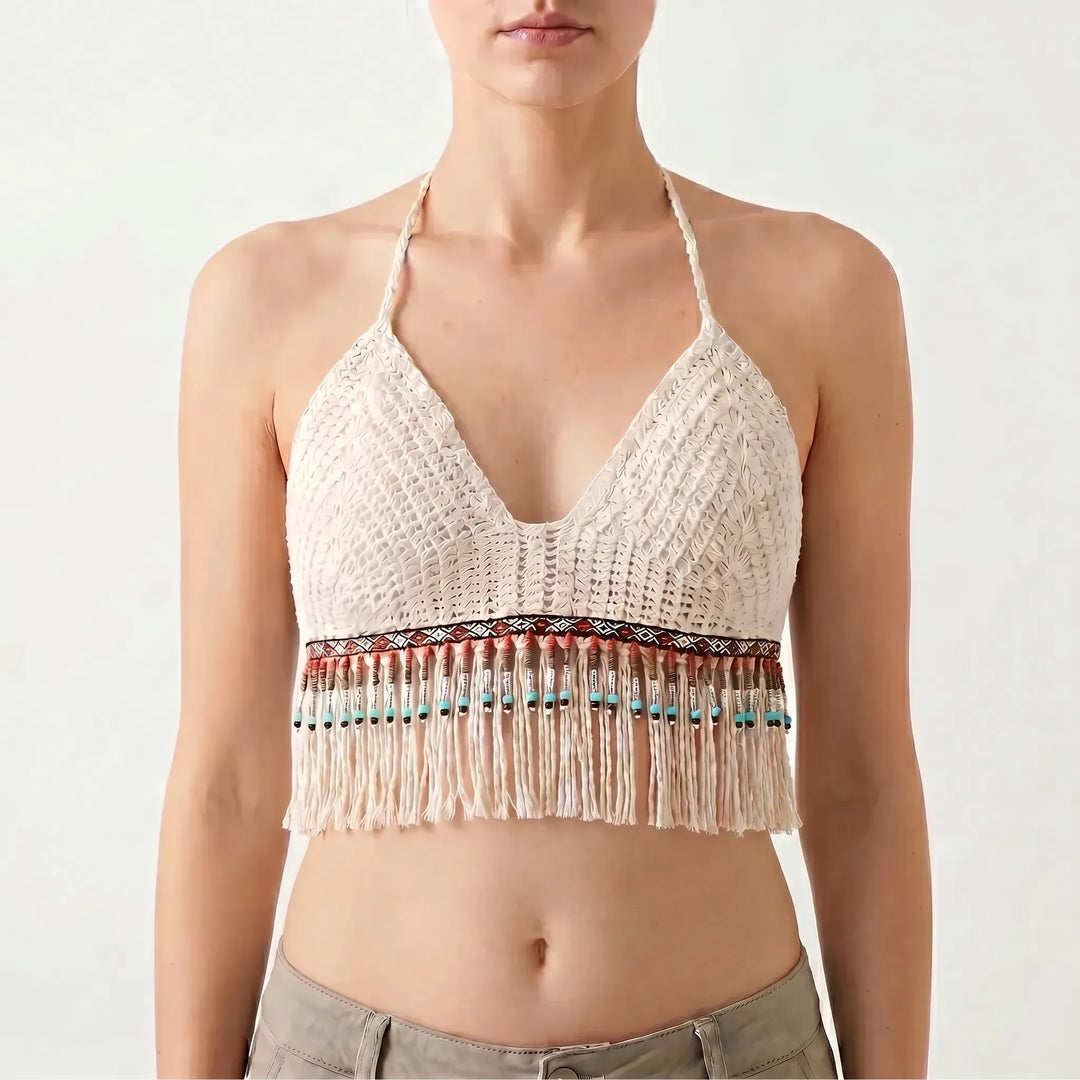 Women's sleeveless fringe crochet halter crop top, a perfect summer fashion piece.