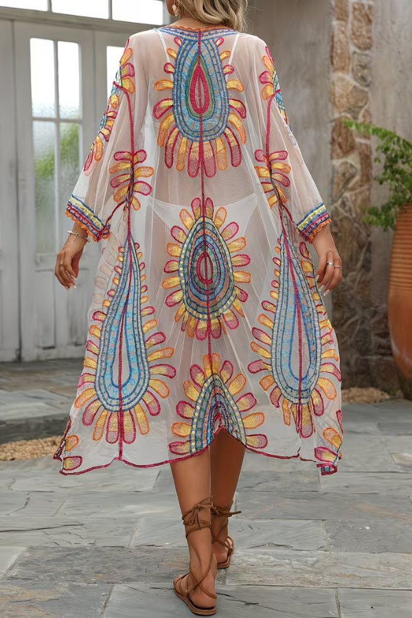 Flowy women's bohemian kimono beach cover-up, a stylish embroidered swimwear piece for effortless resort wear.