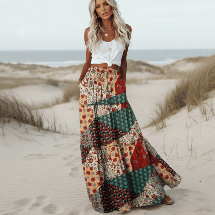 Comfortable women's long floral patchwork skirt with elastic waist & drawstring, ideal for summer bohemian fashion.