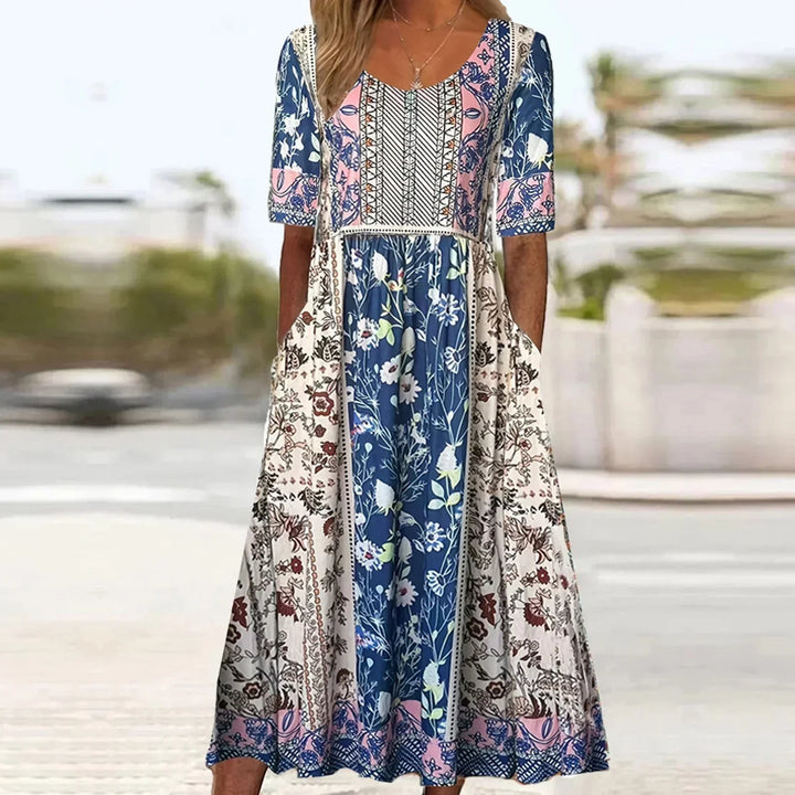 Versatile women's bohemian midi dress with pockets. Perfect for casual summer & fall everyday wear. Short sleeve, round neck.