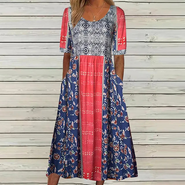Comfortable women's short-sleeve midi dress with flowing bohemian print, round neck, and functional side pockets.