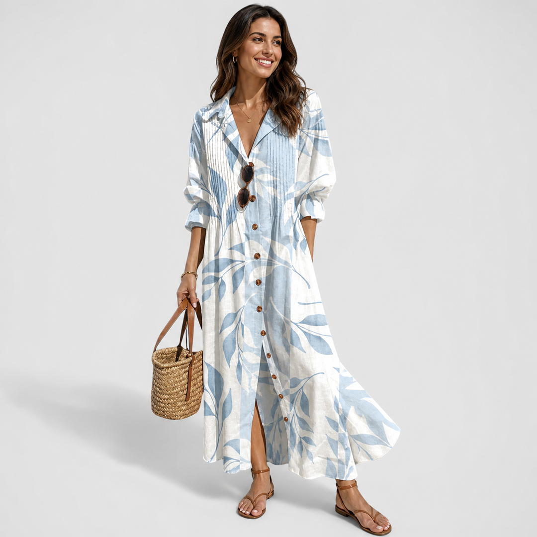 Women's Bohemian printed maxi dress with v-neck, long sleeves, and button front. Perfect for summer resort wear.