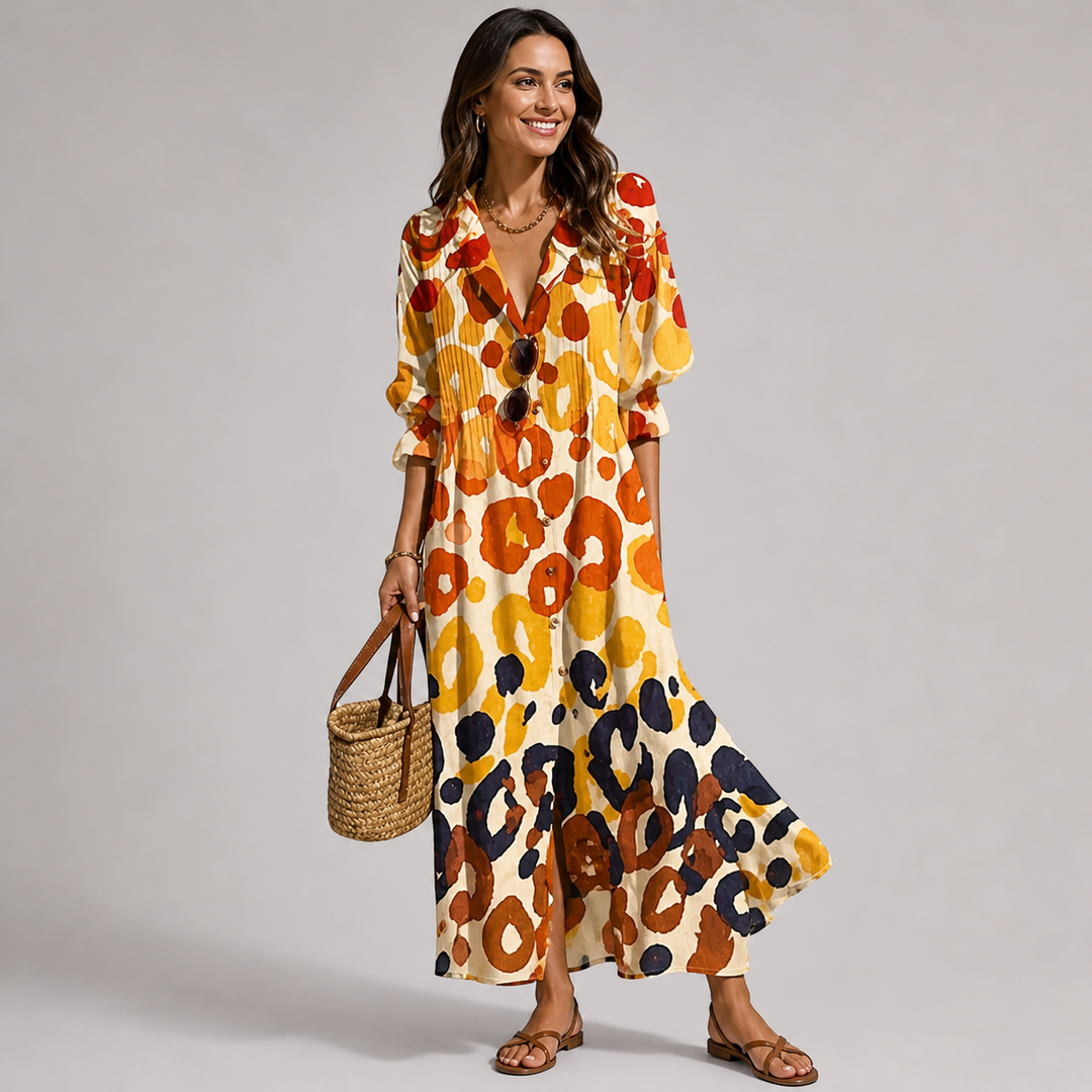 Elegant women's v-neck maxi dress with vibrant bohemian print, long sleeves, and stylish button-front detail.