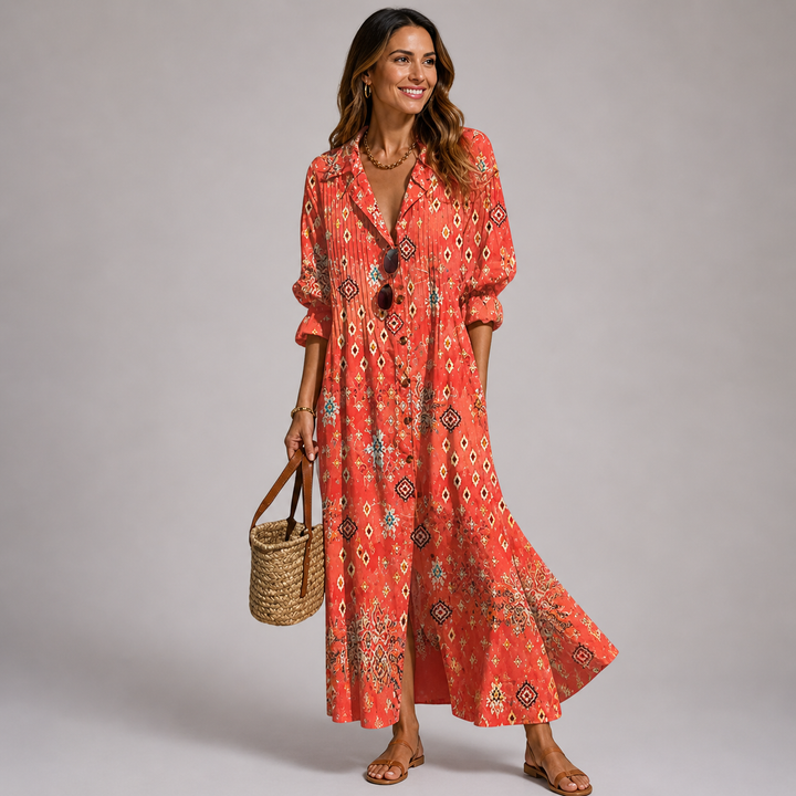Women's long sleeve bohemian maxi dress featuring a unique all-over print, V-neck, and functional button front.