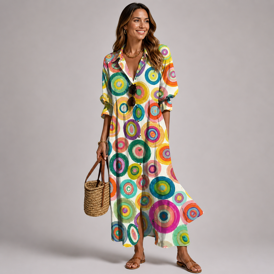 Versatile women's flowing maxi dress with an intricate bohemian print, suitable for casual or elegant occasions.