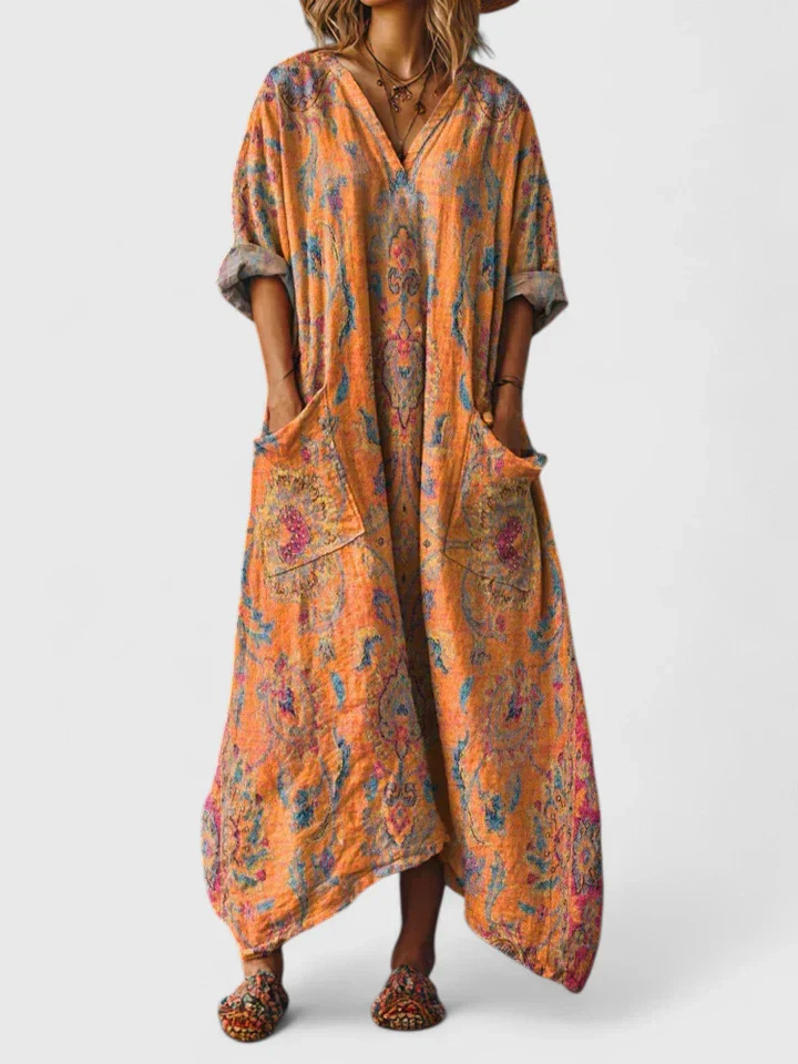 Women's bohemian printed oversized jumpsuit with wide legs, V-neck, and pockets, perfect for casual summer wear.