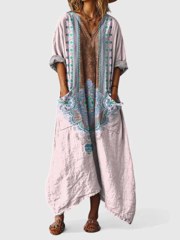Stylish women's oversized jumpsuit featuring a vibrant bohemian print, V-neck, and practical side pockets.