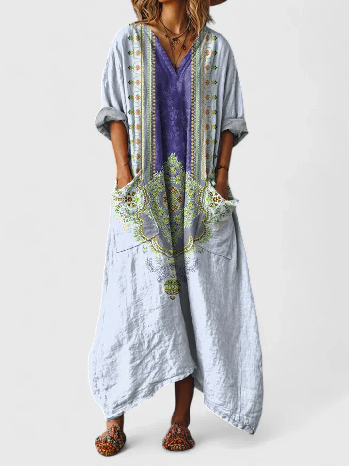 Flowy women's oversized wide leg jumpsuit featuring a bohemian print, V-neck, and convenient pockets.