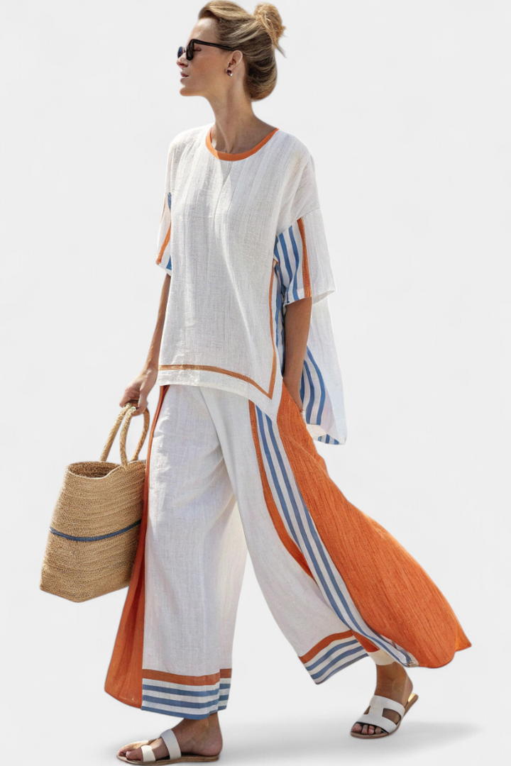 Women's bohemian striped two-piece lounge set with wide-leg pants & tunic top, perfect for summer resort wear.