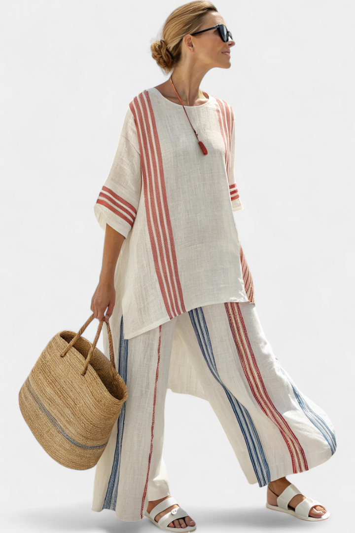 Casual women's striped bohemian lounge set featuring a relaxed tunic top & comfortable wide-leg pants.