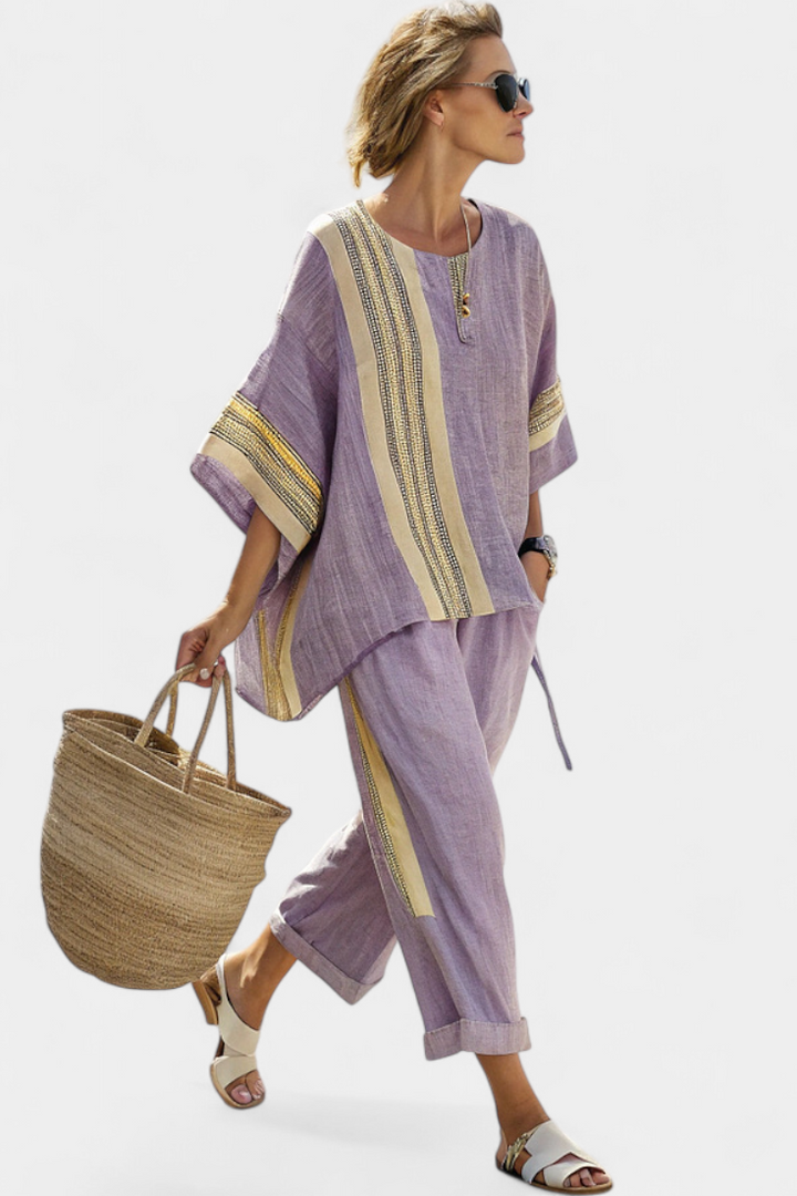 Bohemian striped women's lounge set; a chic two-piece with wide-leg pants and a loose tunic for comfort.