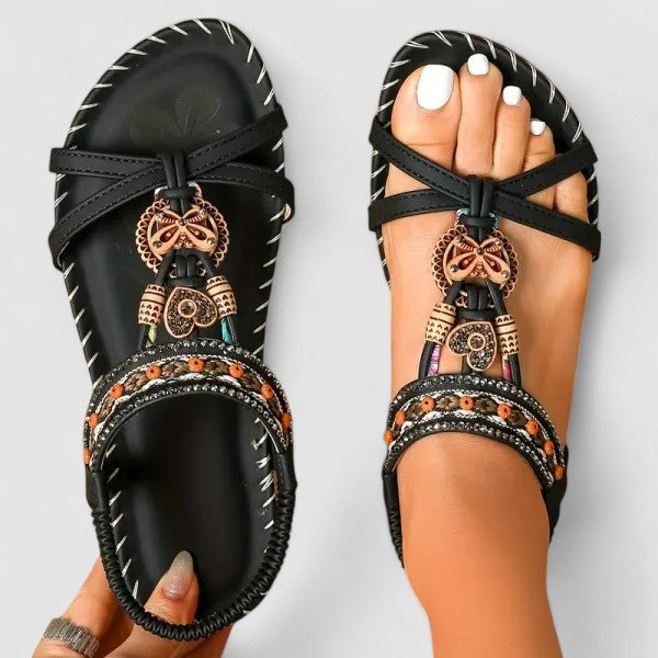 Chic women's boho beaded flat sandals with sparkling rhinestones, ideal resort wear or festival shoes.