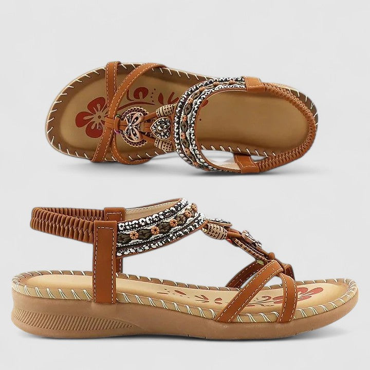 Women's boho beaded flat sandals with elastic strap, rhinestone detail, and comfortable toe ring.