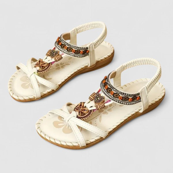 Travel-friendly women's boho flat sandals, embroidered for summer style & comfort.