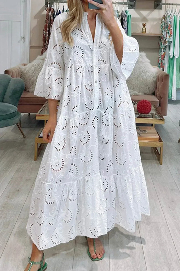 Women's boho embroidered maxi dress, flowy fabric, V-neck, wide sleeves, perfect for summer vacation & beach.