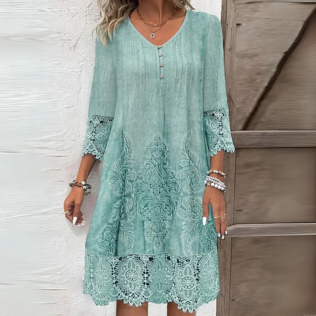Relaxed fit A-line Women's Boho dress with intricate embroidery & V-neck, ideal for comfortable summer fashion.