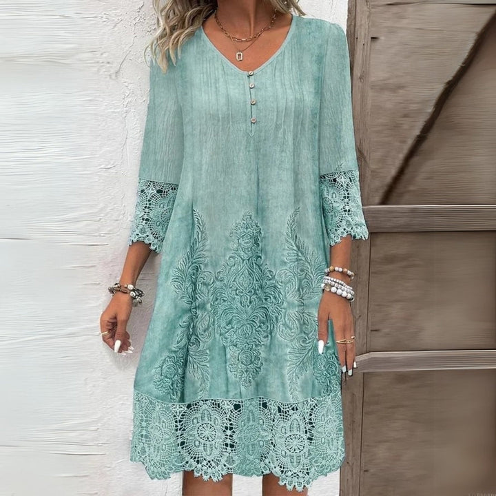 Relaxed fit A-line Women's Boho dress with intricate embroidery & V-neck, ideal for comfortable summer fashion.