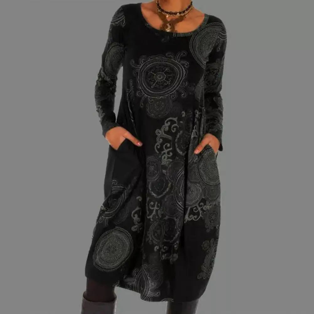 Printed long sleeve midi dress for women. Features beautiful boho floral design.