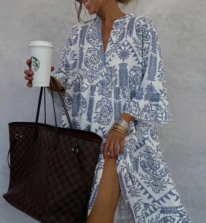 Effortless bohemian fashion: women's casual A-line swing dress with vibrant floral print and elegant V-neck.