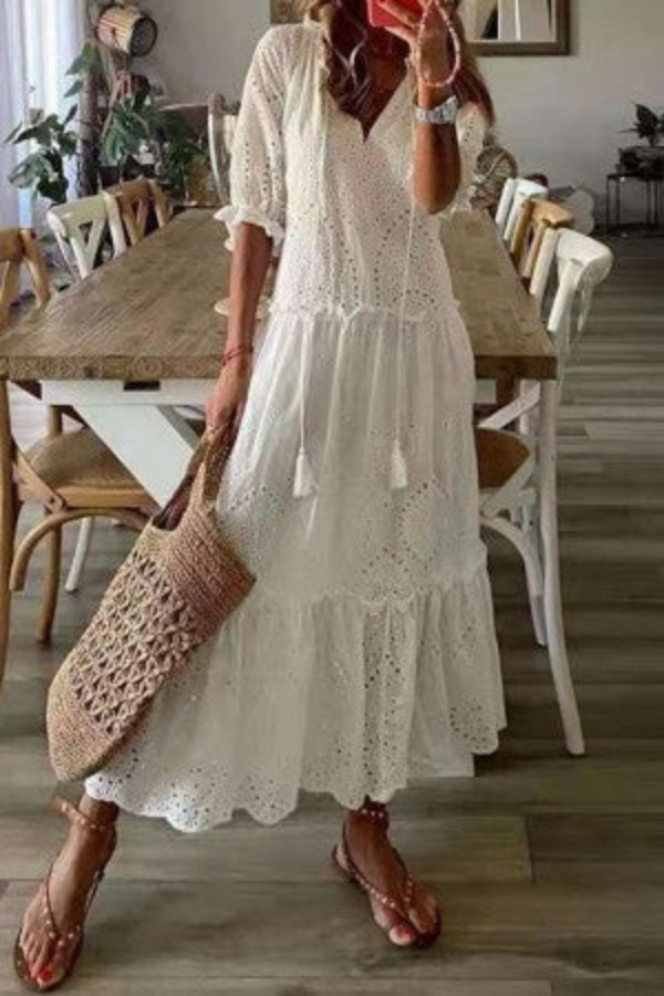 Flowy floral print maxi dress for women, ideal beachwear or a stylish summer vacation outfit.