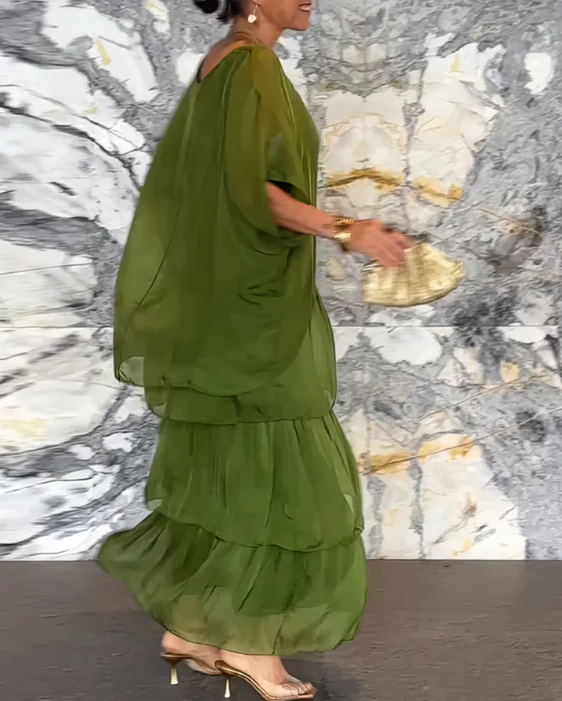An elegant casual women's boho layered dress set, featuring a graceful flowy batwing top & tiered maxi skirt.