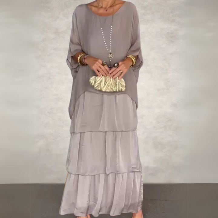 Tiered maxi skirt, part of a women's boho layered dress set, ideal for elegant casual vacation wear.