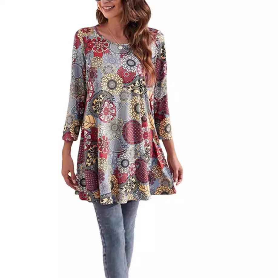 Chic women's boho tunic top with vibrant mandala pattern, three-quarter sleeves, perfect for casual looks.