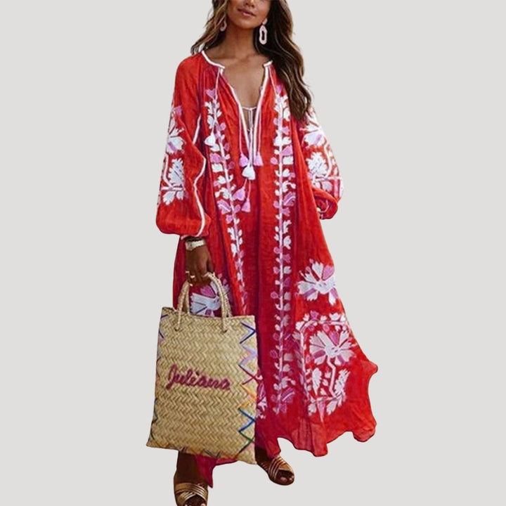 Women's boho maxi dress with V-neck, long sleeves, and a flowing, loose fit for casual wear.
