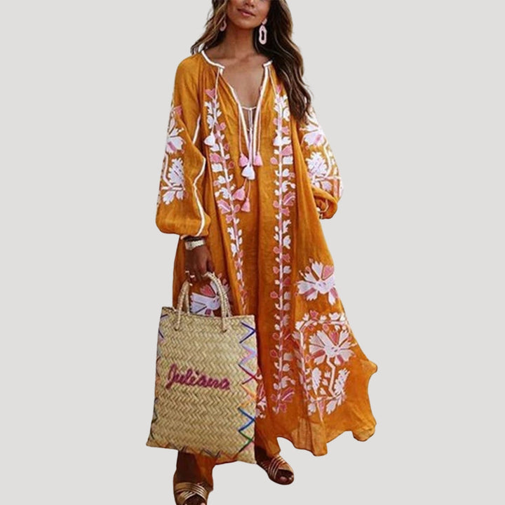 Stylish women's casual boho maxi dress with a V-neck, long sleeves, and a beautiful flowing patterned design.