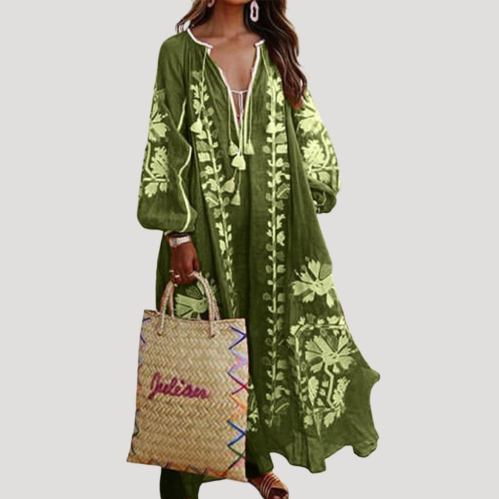Women's long sleeve boho maxi dress, V-neck, patterned design, offering a flowing and relaxed fit for casual comfort.