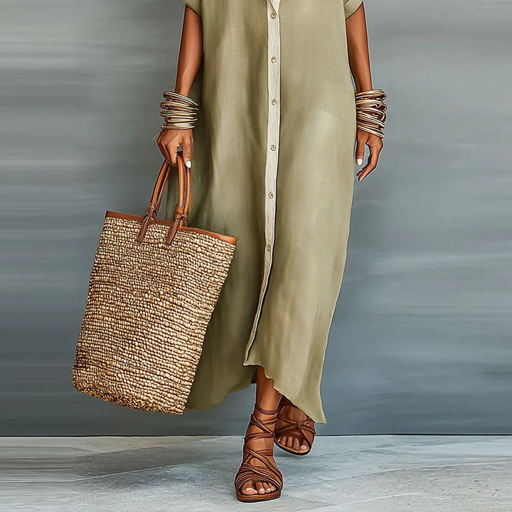 Casual women's boho maxi dress with a striking contrast print, button front & comfortable relaxed fit.