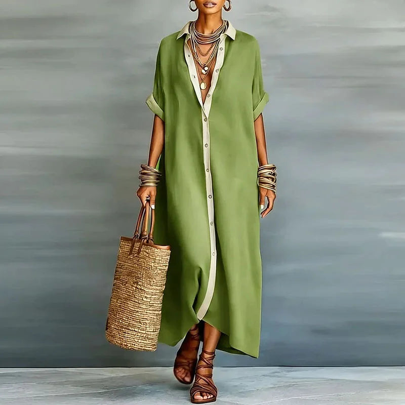 Front view of a women's boho maxi shirt dress, button-front, short-sleeve, chic contrast print, relaxed fit.