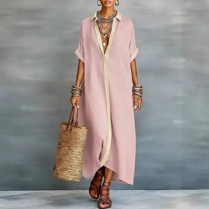 Women's versatile boho maxi dress with short sleeves, casual shirt style, and eye-catching contrast print.