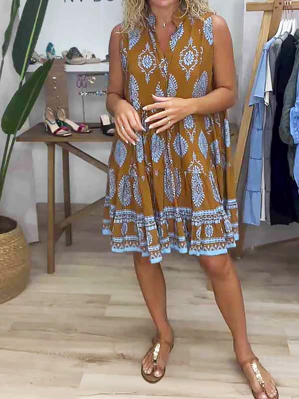 Women's boho medallion print ruffle mini dress with flowing smock style, perfect for summer casual wear.