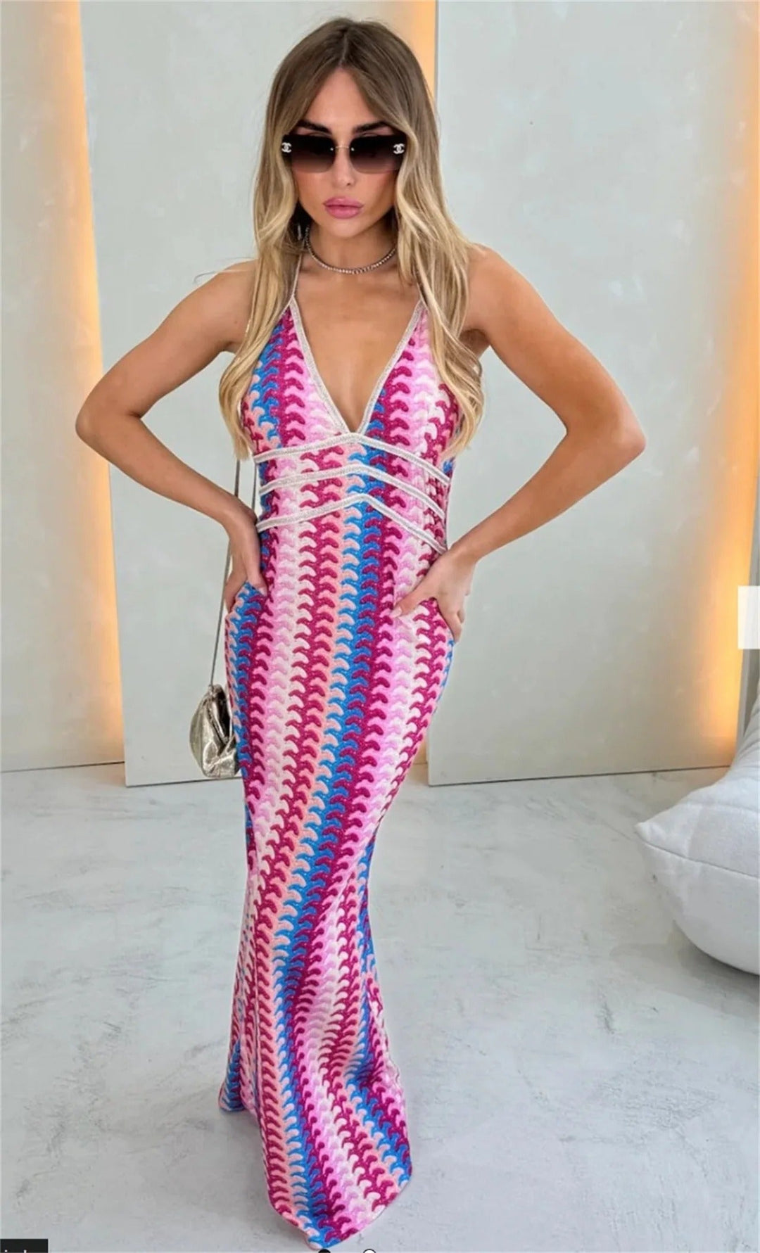 Women's boho printed V-neck maxi dress, perfect for wedding guests, with a flowy, elegant design.