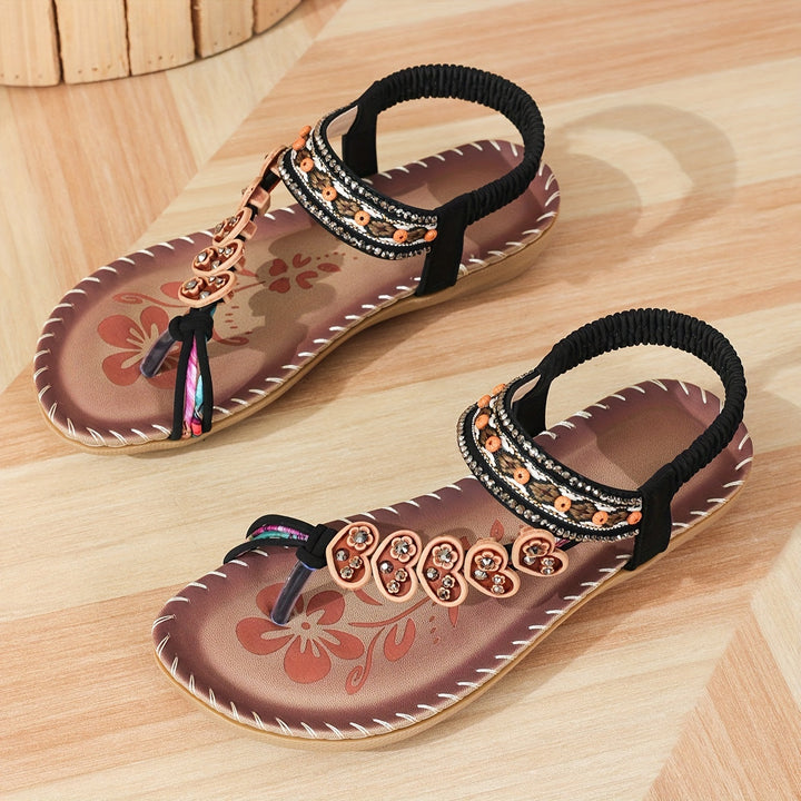 Bohemian style flat sandals for women, featuring intricate beadwork & dazzling rhinestones, summer footwear.